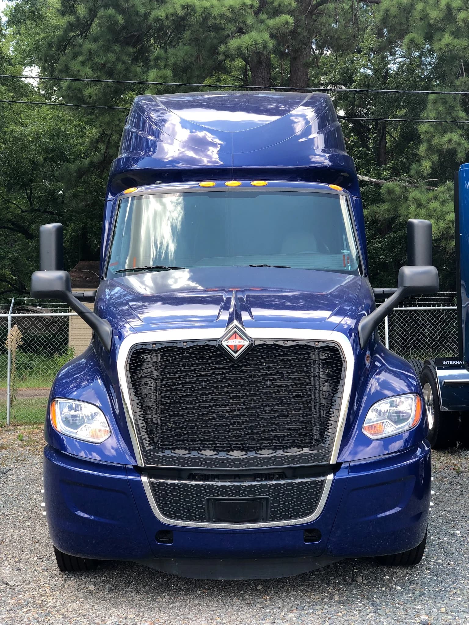 Front view of a blue International tractor in the CTS fleet