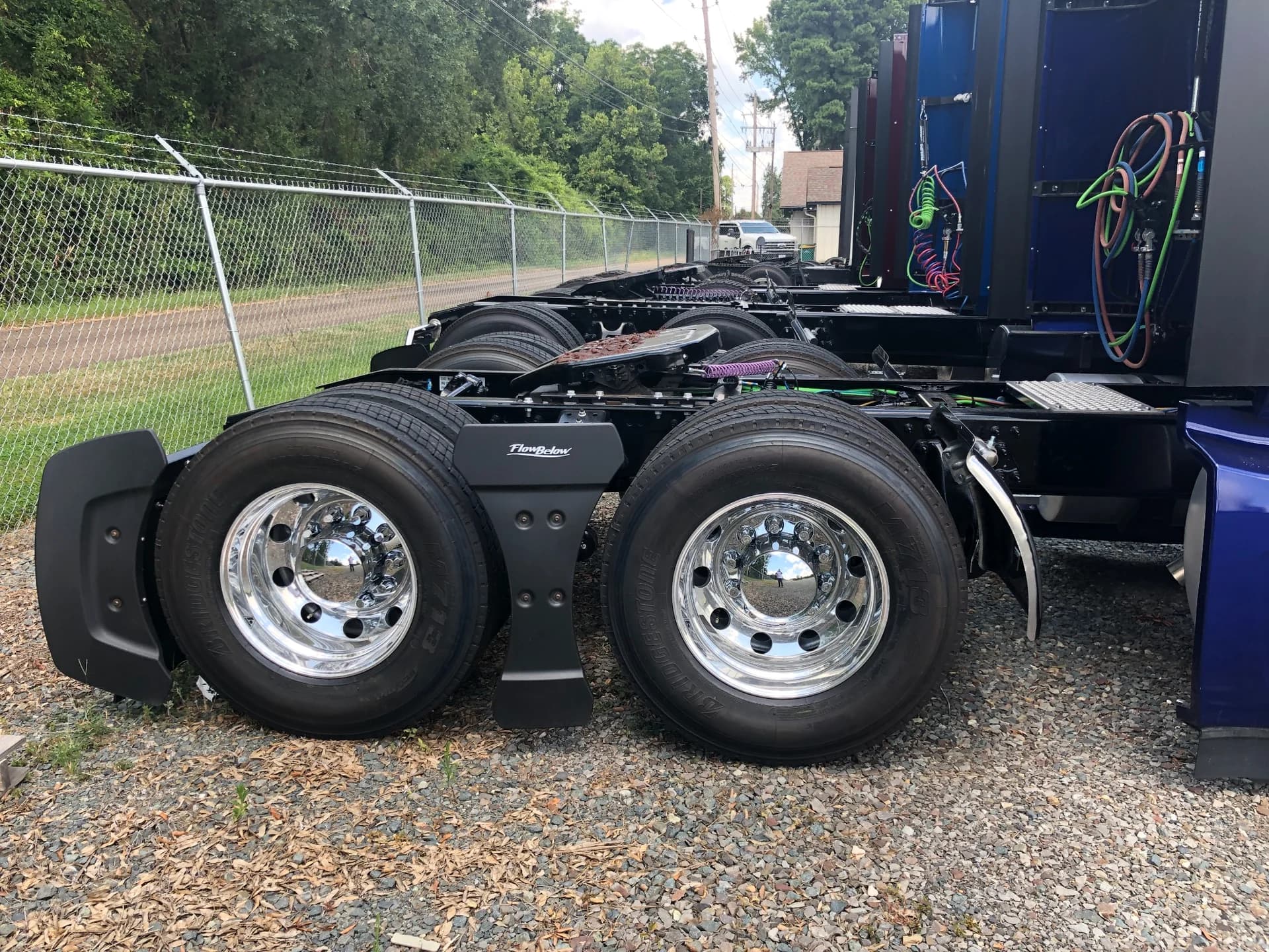 Polished wheels and rear chassis detail on a CTS tractor